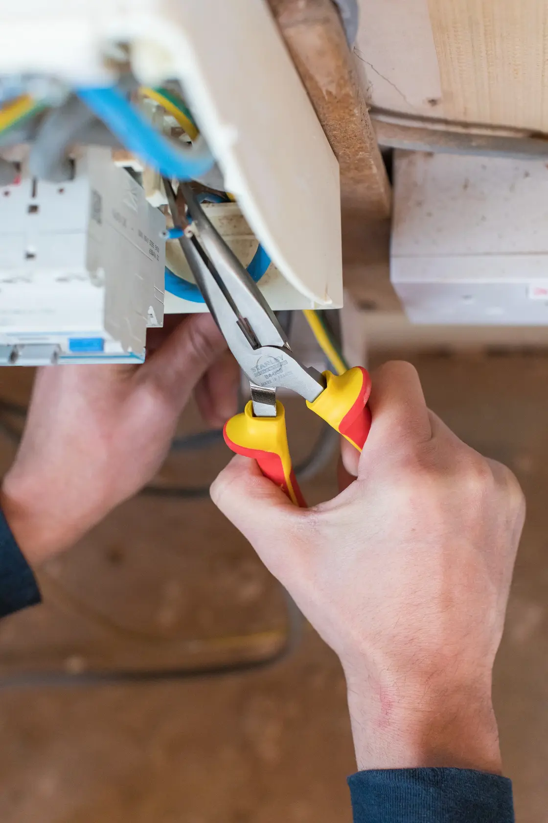 Photo of STANLEY 0-84-008 insulated long nose pliers used for electrical wiring.