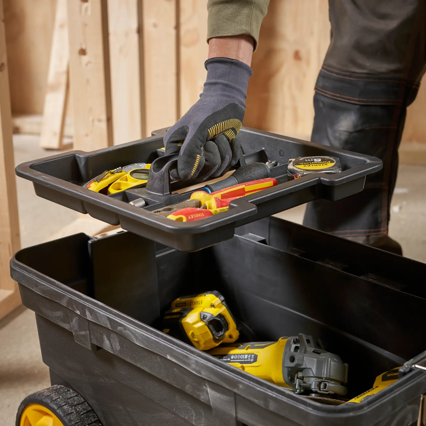 STANLEY 1-97-503 mobile toolbox with removable tray and assorted tools, photo of top view in workshop.