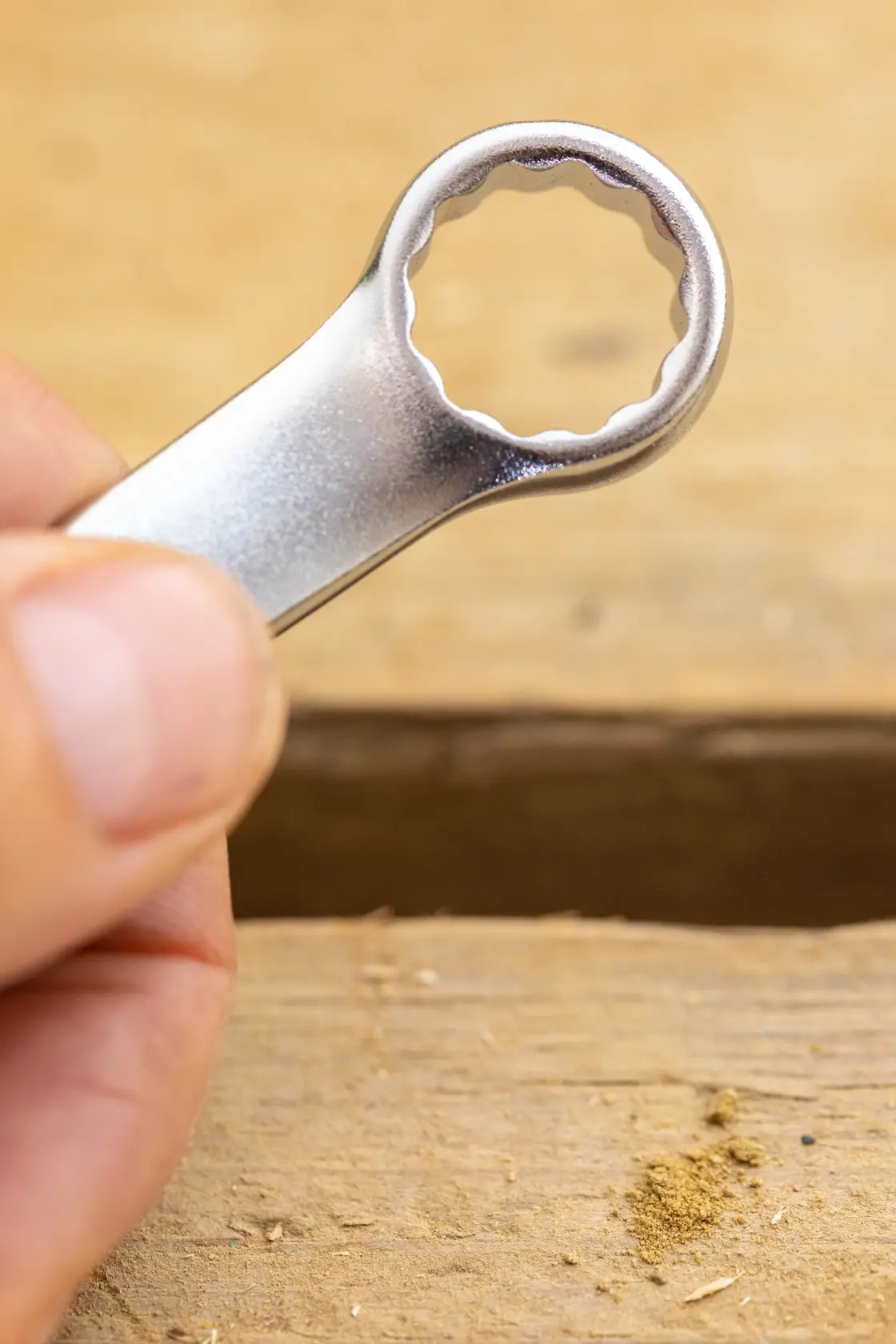 STANLEY FMMT13042-0 wrench close-up held by hand, metallic finish, photography of tool head.