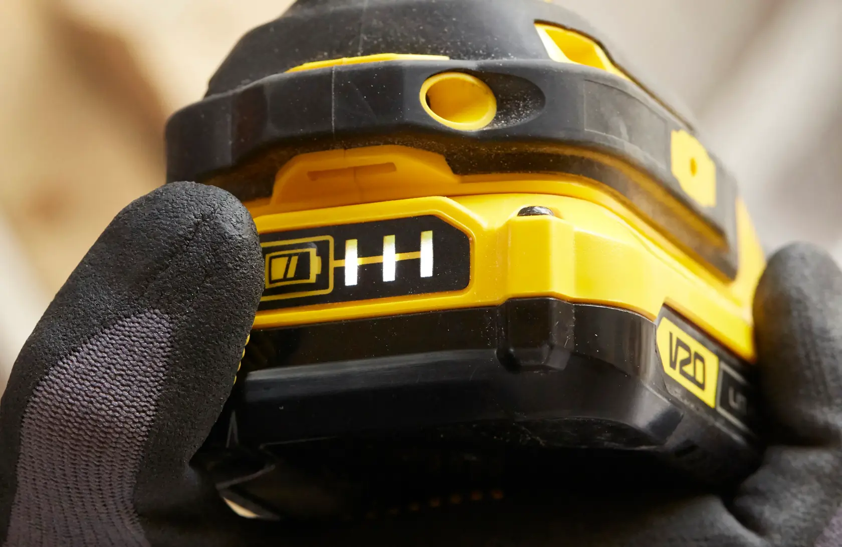 STANLEY SFMCF810D2K cordless tool close-up with battery indicator, yellow and black color.