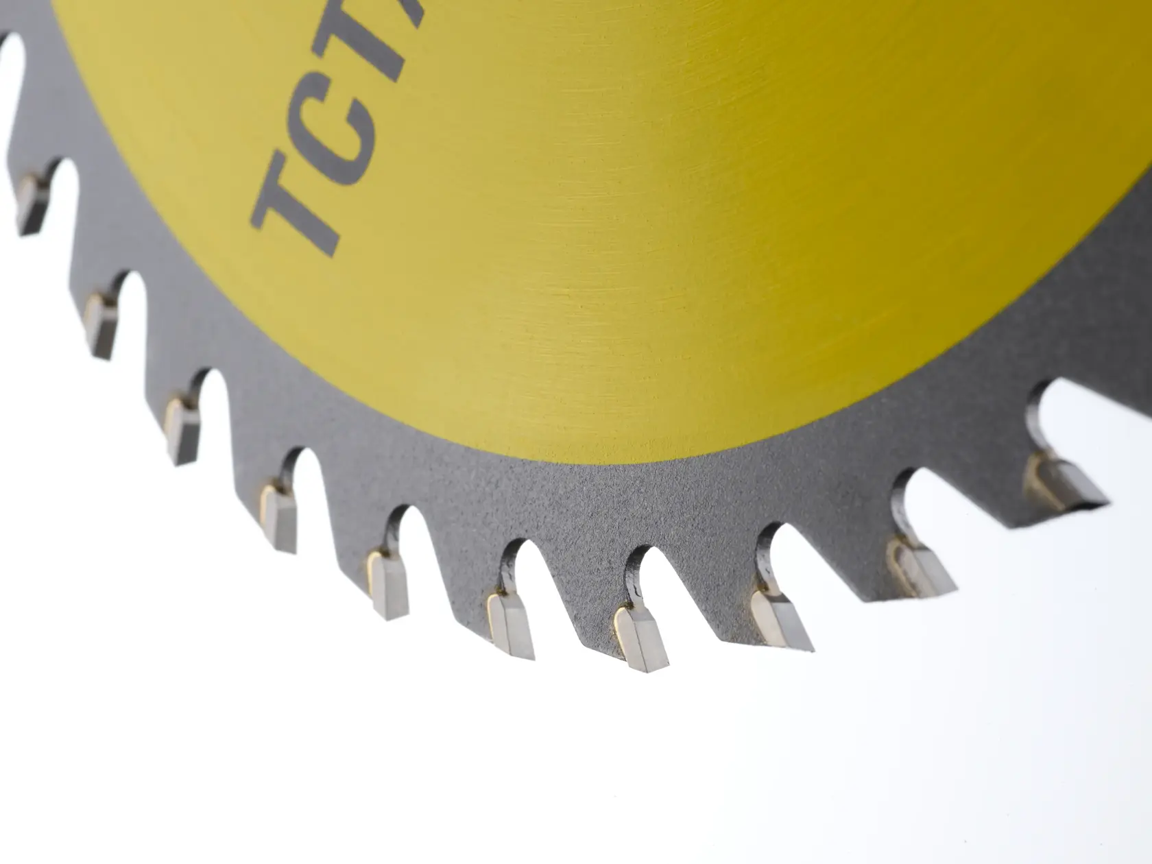 STANLEY STA13105 circular saw blade close-up, yellow and silver, visible tungsten carbide-tipped teeth.